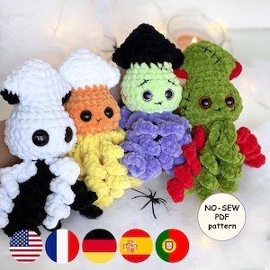 May include: Four handmade crochet Halloween-themed plush toys. The toys are in the shape of friendly monsters, each with unique colours and features. The toys include a white ghost, an orange candy corn, a green Frankenstein, and a green octopus. The toys are soft and cuddly.
