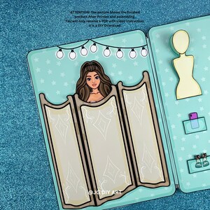 Puede incluir: Un kit de manualidades digital con una ni&ntilde;a de dibujos animados de pie detr&aacute;s de una pantalla de tres paneles. La pantalla est&aacute; decorada con un patr&oacute;n de diamantes. La imagen incluye el texto "@JG DIY ART".