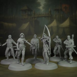 May include: Six unpainted miniature figures of archers and swordsmen on circular bases. The figures wear medieval clothing, including hoods, cloaks, and armour. One figure draws a bow, others hold swords. The background depicts a medieval camp with tents and a gate.