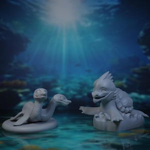 May include: Two grey fantasy creature figurines. One resembles a sea serpent, the other a turtle-like creature. The sea serpent has two heads and is on a circular base. The turtle-like creature has a spiky crest and is seated.