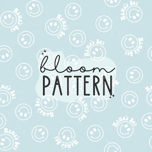 May include: A light blue background with a white smiley face pattern. The text "Mama's Boy" is repeated throughout the pattern. The text "bloom PATTERN" is written in black in the center of the image.