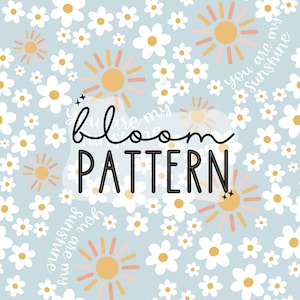May include: A light blue background with a white daisy and sun pattern. The text "You are my sunshine" and "Bloom Pattern" are written in black.