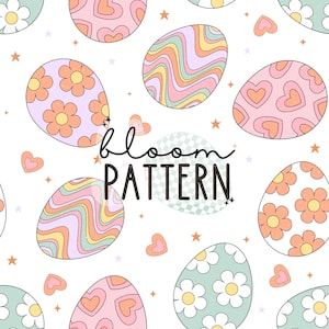 May include: A seamless pattern featuring pastel colored eggs with different floral and heart designs. The text "bloom pattern" is written in black on a checkered background.