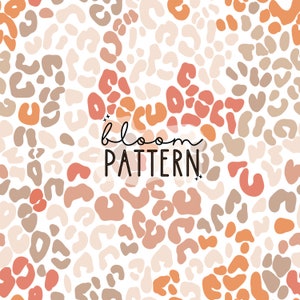 May include: A seamless pattern featuring abstract brown, orange, and pink leopard spots on a white background. The text "bloom pattern" is centered on the image.