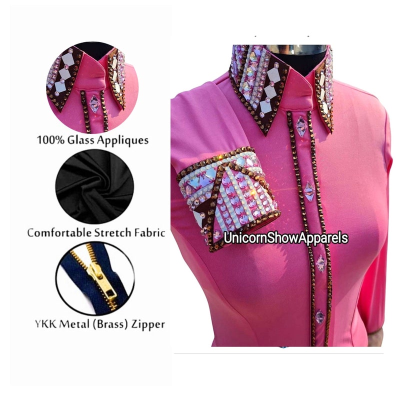 May include: Pink long-sleeve shirt with brown trim and crystal embellishments. The shirt features a collar with a checkered pattern and a YKK metal zipper. The fabric is described as comfortable stretch fabric. The text "UnicornShowApparels" is visible on the shirt.