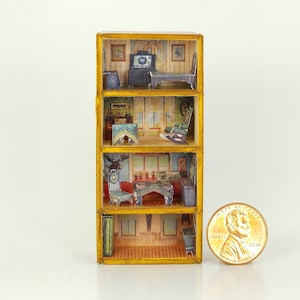 May include: A miniature dollhouse with four levels, each depicting a different room. The dollhouse is made of wood and painted yellow. The rooms are decorated with furniture and other details, such as a fireplace, a bed, and a desk. The dollhouse is about the size of a US penny.