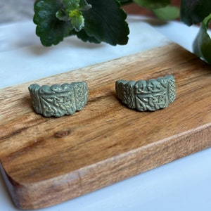 Celtic green Huggie earrings