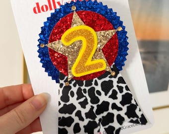 Personalised Toy Story Birthday Badge, Glitter Number, Cow Print Ribbon