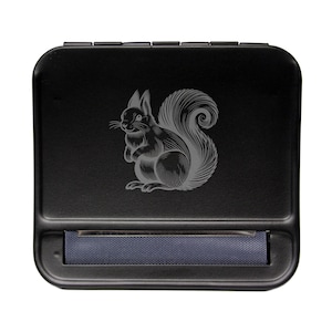 May include: Black metal rolling tray with a squirrel design. The tray has a built-in rolling mechanism.
