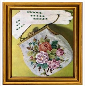 May include: A white beaded evening bag with a floral design of pink, red, and white roses. The bag is framed in gold and has a matching white beaded glove with green accents.