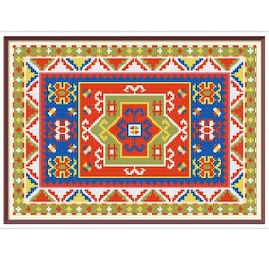 Può includere: Un motivo a punto croce incorniciato con un disegno geometrico di tappeto. Il tappeto ha uno sfondo rosso con forme geometriche blu, gialle, verdi e bianche. La cornice è di colore marrone scuro.