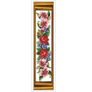 May include: A framed cross-stitch embroidery featuring a vertical arrangement of pink lilies, red roses, and blue flowers. The flowers are surrounded by green leaves and are set against a white background.