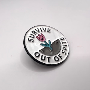 Survive out of spite pin badge. Sarcastic pin with flower detail