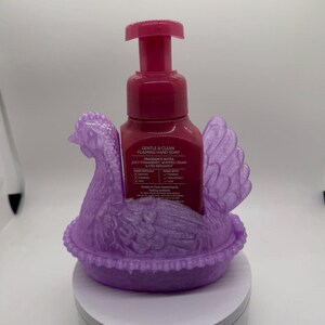 May include: A rustic wooden sign with the text "Welcome to our home" in white lettering. The sign features a distressed finish and a simple, inviting design, perfect for a front porch or entryway.