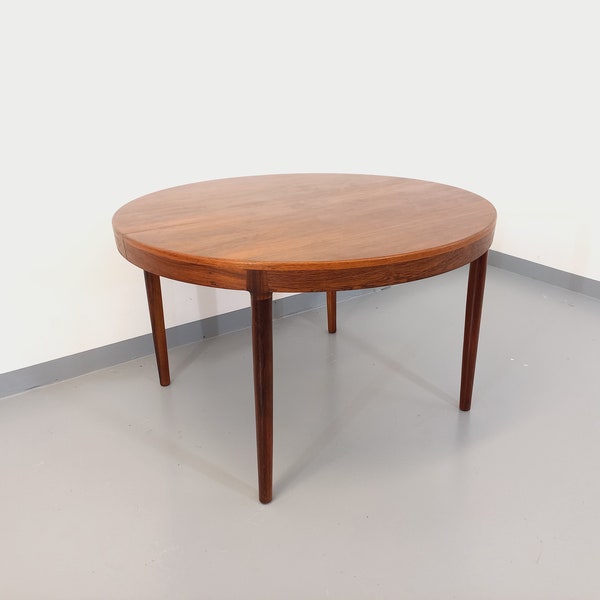 Vintage Danish round table from the 60s in rosewood with extensions, by Harry Ostergaard for Randers Møbelfabrik