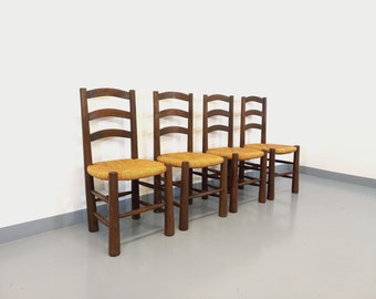 Suite de 4 chaises brutalistes vintage Georges Robert en bois et paille des années 50 60