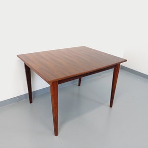 Vintage Scandinavian style dining table from the 50s and 60s in rosewood with extensions