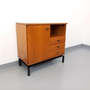 Vintage modernist style storage unit by Marcel Gascoin for Alveole in oak wood and black metal from the 50s