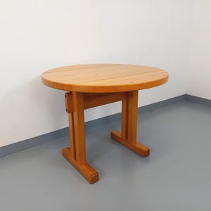 Vintage Charlotte Perriand Les Arcs round pine dining table from the 60s 70s