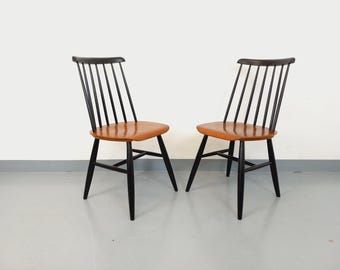 Pair of vintage Scandinavian Fanett chairs by Ilmari Tapiovaara in teak and black wood from the 1950s/60s