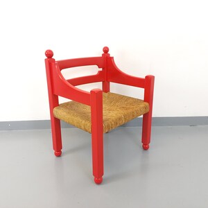 Vintage Italian Vico Magistretti style armchair in red wood and straw from the 60s and 70s