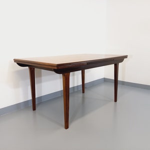 Vintage Scandinavian style dining table from the 50s and 60s in rosewood with extensions