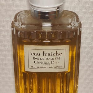 Christian Dior Eau Fraîche Eau de Toilette 100 ml. Label. Cap slightly worn. 90% full, or approximately 90 ml. Juice in perfect condition
