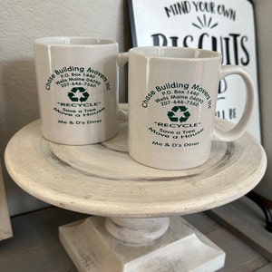 Pair of House Mover Logo Company Mugs