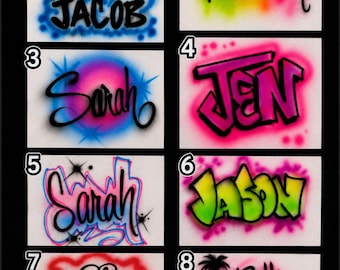 May include: A collection of eight airbrushed designs labeled one through eight, featuring names like Jacob, Hannah, Sarah, Jen, Jason, Cory, and Beth. The graphics include a yellow crown, colorful gradients, graffiti-style lettering, a blue monster, and a palm tree.