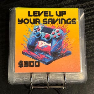 Améliorez vos économies Livre à gratter pour gamer 300 Enveloppes pour manette de jeu vidéo Reliure de défi Rembourrage en espèces Fonds d'amortissement Insertion budgétaire