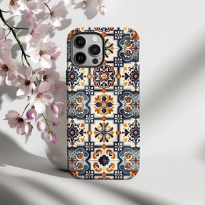 May include: A phone case with a colorful geometric pattern in shades of blue, yellow, and white. The case has a cutout for the camera lens.