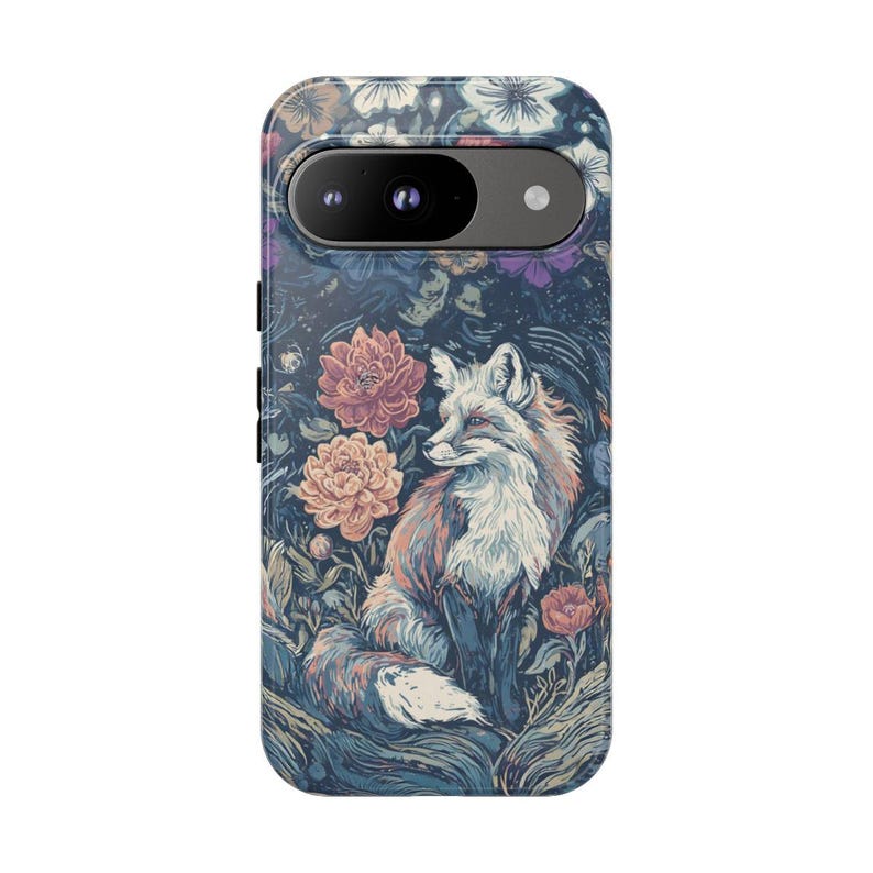 May include: A phone case featuring a detailed illustration of a fox amidst a floral garden. The fox has white and orange fur, with a focused gaze. The background is a dark blue with flowers in shades of pink, orange, and purple.