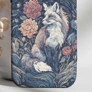 May include: A phone case featuring a detailed illustration of a fox amidst flowers and foliage. The design incorporates shades of blue, peach, and white, creating a nature-inspired aesthetic. The artwork is reminiscent of a vintage painting.