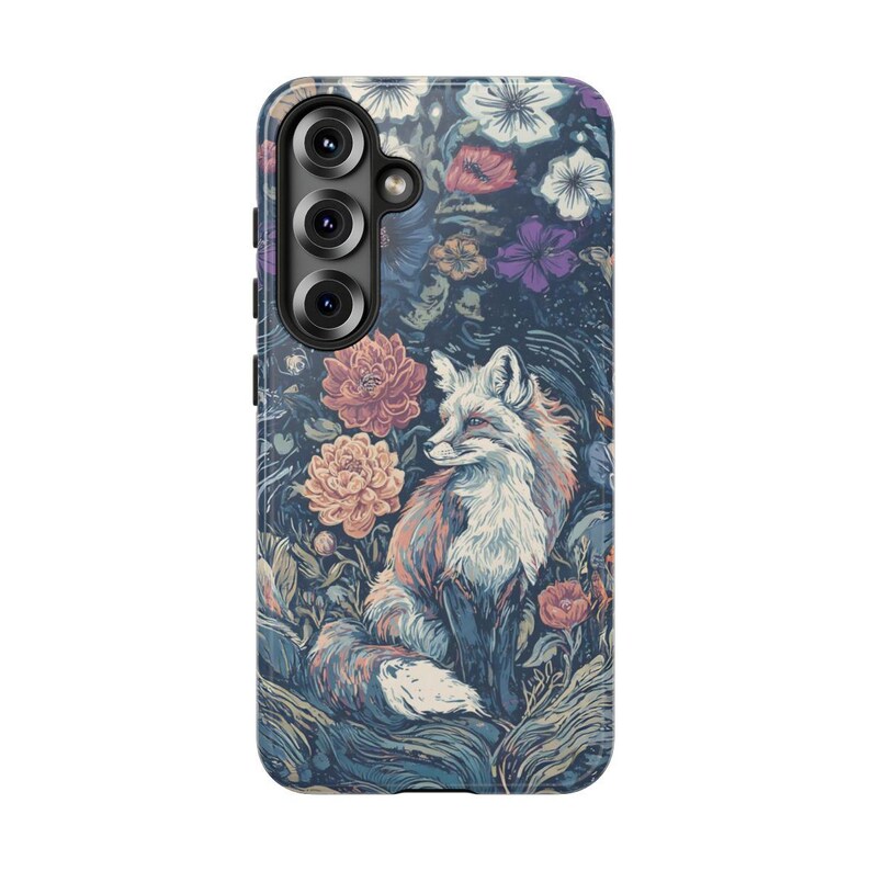 May include: A phone case featuring a detailed illustration of a fox amidst a floral garden. The design showcases a fox with orange, white, and brown fur, surrounded by various flowers in shades of pink, purple, and white, set against a dark blue background.