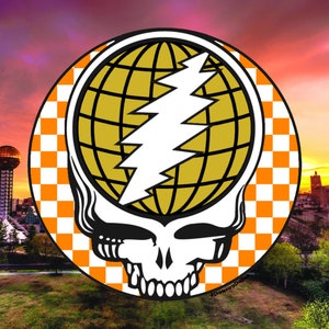 May include: A round sticker with a black and white checkered background. The center of the sticker features a yellow globe with a white lightning bolt design. The globe is inside a white skull with a black lightning bolt design. The text "@DouceyDahl" is in the lower right corner of the sticker.