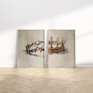 May include: Two framed watercolor prints. One depicts a crown of thorns, the other a golden crown. Both are set against a textured, neutral background. The artwork evokes themes of royalty and sacrifice.