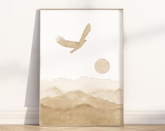 May include: Framed art print featuring a watercolor illustration of a soaring eagle, a sun, and layered mountain silhouettes in shades of brown. The print includes text from Isaiah 40:31. A decorative piece for home decor.