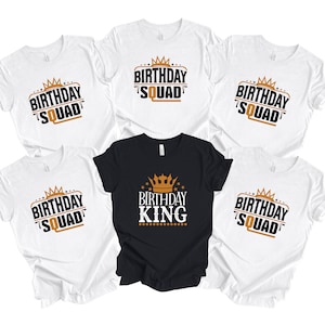 May include: Five white t-shirts with black text and gold crowns. One black t-shirt with gold text and a gold crown. The shirts say "Birthday Squad" and "Birthday King".