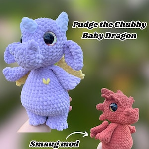 May include: Two crochet baby dragons in the image. One is a large lavender dragon with yellow wings and a small yellow heart. The other is a smaller red dragon. Text on the image says "PDF Pattern ONLY", "Pudge the Chubby Baby Dragon", and "Smaug mod included!"