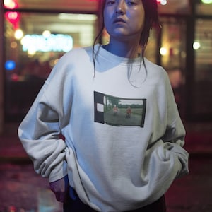 Crewneck Moped Love, as seen in &quot;Video Games&quot; by Lana Del Rey