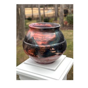 Crackle Raku pot, fired in a saggar with soluable salt solution