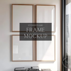 May include: Four empty picture frames with a light wood finish are arranged in a grid pattern on a white wall. The frames are all the same size and have a simple, modern design. The frames are set against a backdrop of a window with a view of a city skyline.