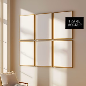 以下が含まれることがあります： 薄いベージュの壁に、金色の額縁が6つ、グリッド状に配置されています。額縁は空で、あなたの芸術作品や写真を入れる準備ができています。FRAME MOCKUPは、黒い長方形に黒い文字で書かれています。