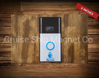 May include: A 6-inch white and black doorbell cover with a blue circle and a ship graphic. The text "Sea King" is printed on the cover.