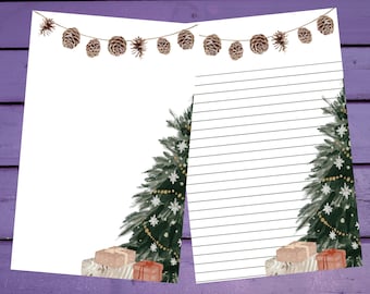 May include: A printable stationery set featuring a watercolor illustration of a Christmas tree with presents and a pine cone garland. The paper has lined writing space.