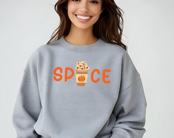May include: Gray sweatshirt with the word "SPICE" in orange letters and a cartoon image of a pumpkin spice latte in the middle of the word.