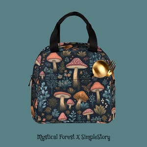 May include: A black insulated lunch bag with a whimsical mushroom and forest pattern. The bag has a black handle and a small pocket with a gold-colored spoon and fork. The text "Mystical Forest X SimpleStory" is printed at the bottom.