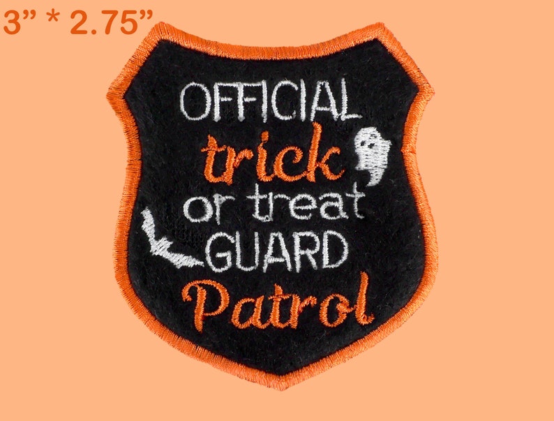 May include: A black and orange embroidered patch with the text "OFFICIAL trick or treat GUARD Patrol" and a ghost and bat graphic. The patch is 3 inches by 2.75 inches.
