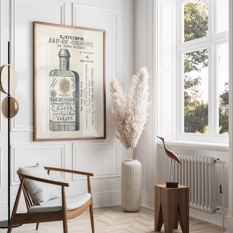 May include: Vintage advertisement for Luce's Eau-de-Cologne, a cologne manufactured in Jersey. The advertisement features a black and white illustration of a bottle of cologne with the brand name and address printed on the label.