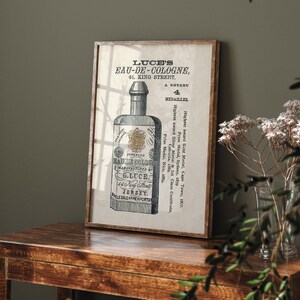 May include: Vintage advertisement for Luce's Eau-de-Cologne, a cologne manufactured in Jersey. The ad features a bottle of cologne with a gold label and text that reads "LUCE'S EAU-DE-COLOGNE, 44 KING STREET, JERSEY." The ad also mentions that the cologne has won four medals.